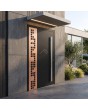 black entry door covered copper sheet with cut-out squares