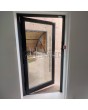 Aluminum framed glass pivoting entrance door