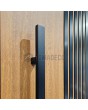 LIM RAIL6 - aluminum front  door with black vertical slats made of aluminum profiles