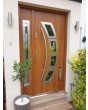 Golden oak stainless steel front door with one side panel