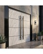 Black aluminum double front door covered with white rock stone texture
