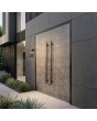 Black aluminum double front door covered with sintered quartz